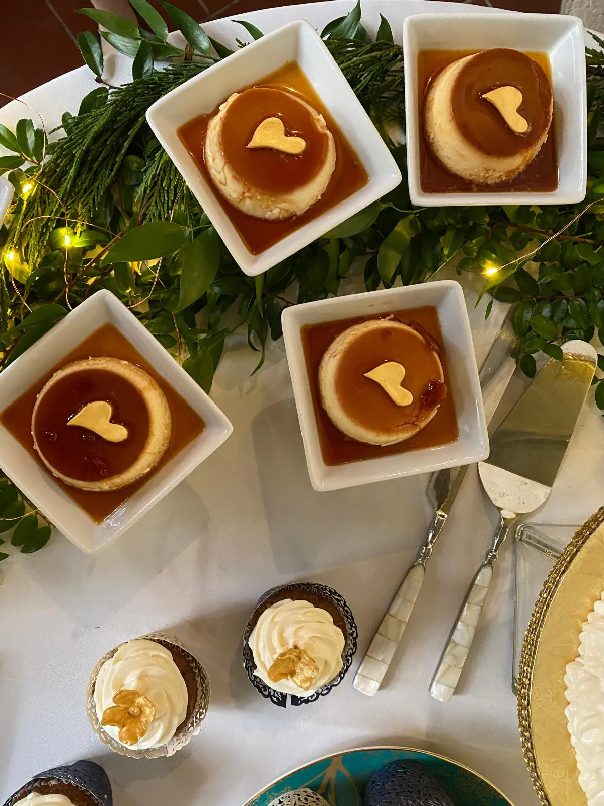 flans & cakes Mini flans with gold hearts on a wedding dessert table